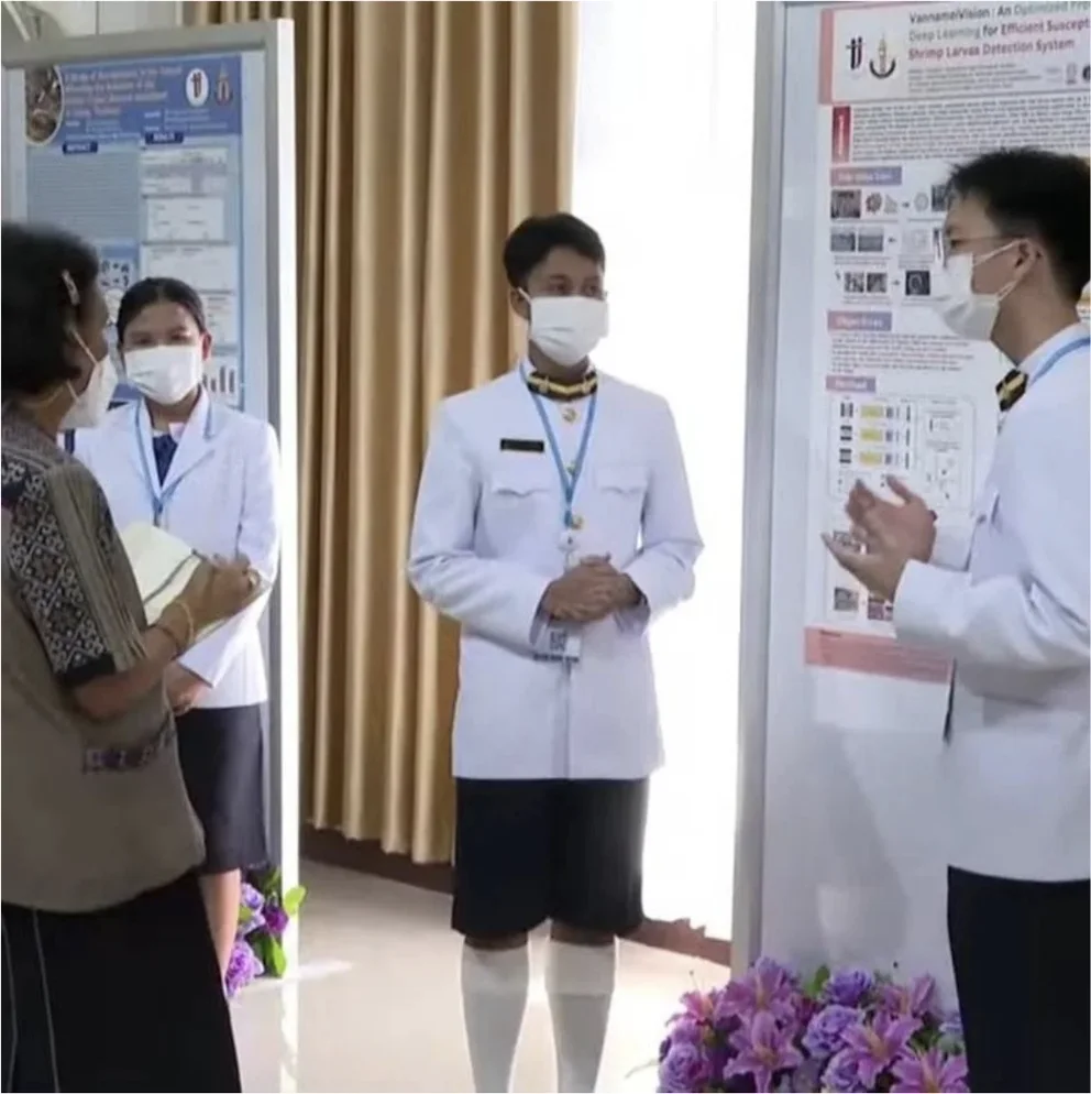 The VannameiVision team, in white, presenting their project to HRH Princess Maha Chakri Sirindhorn at TJ-SSF 2023